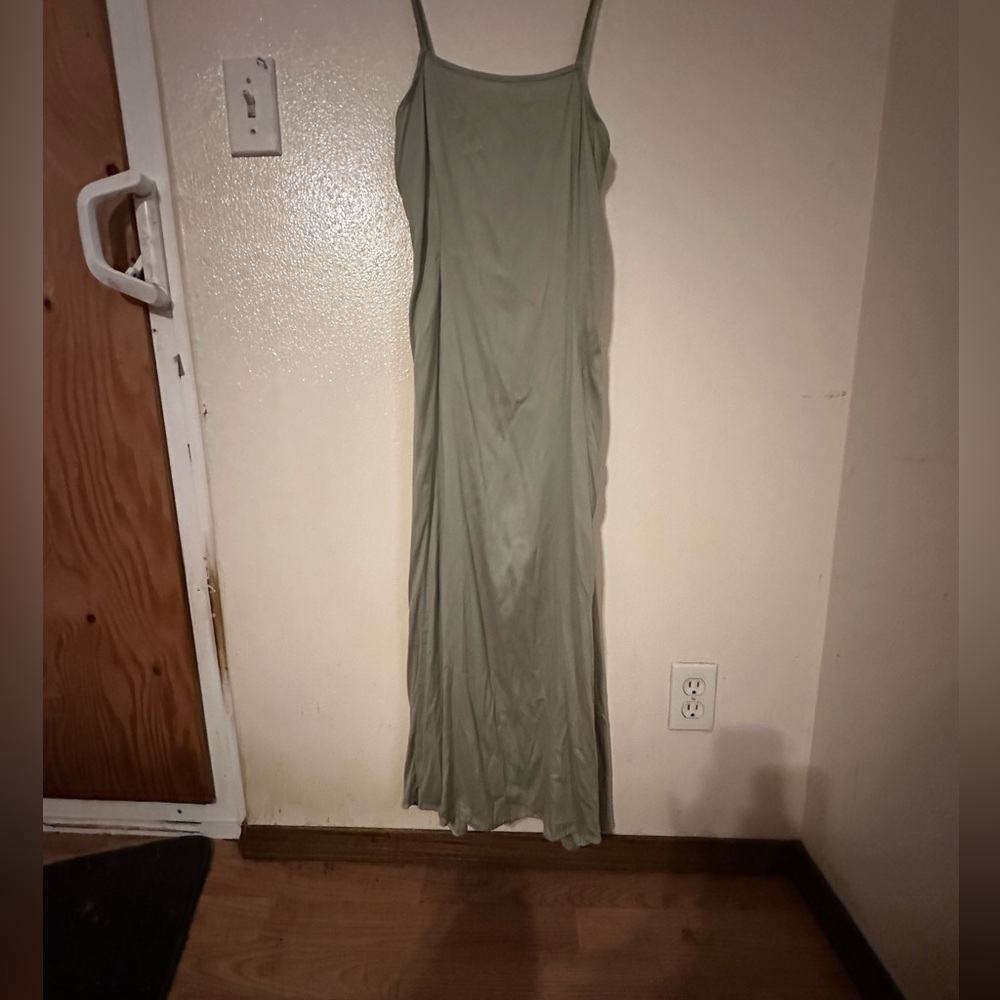 Mahina brand very soft and sleek dress never used but lost the tag